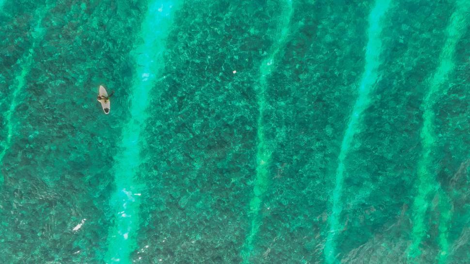 Free Image of Man Riding Surfboard on Wave in Ocean 