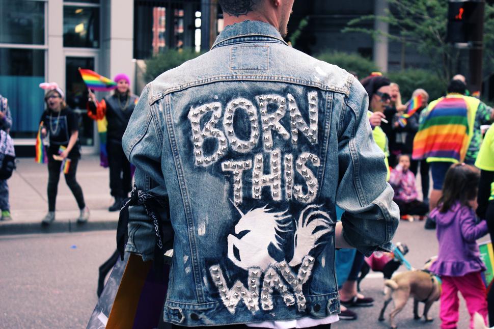 Free Image of Man in Denim Jacket With Unicorn Painting 