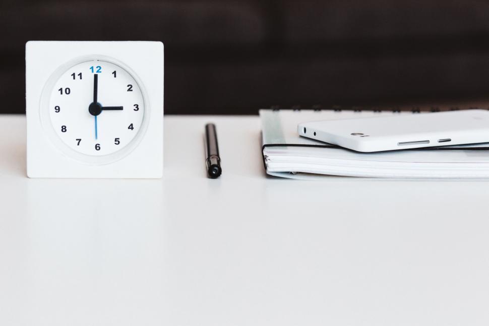 Free Image of White Clock on White Table 