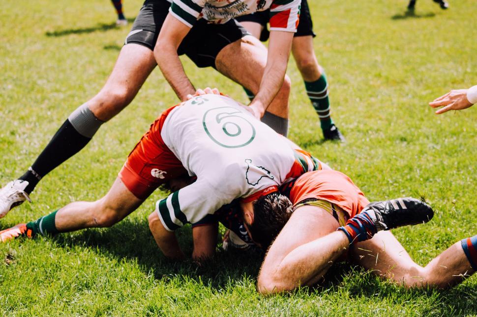 Free Image of Group of Men Playing a Game of Football 