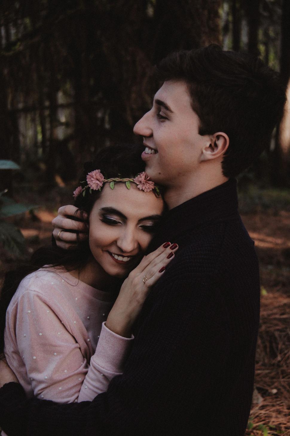 Free Image of Man and Woman Hugging in the Woods 