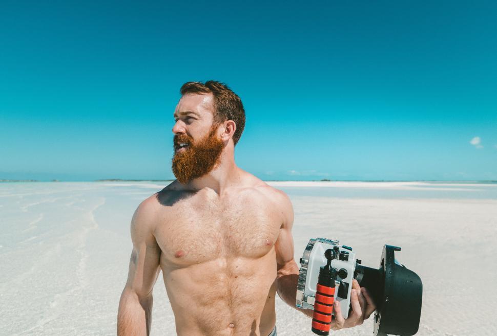 Free Image of Man Holding Drill and Tool 