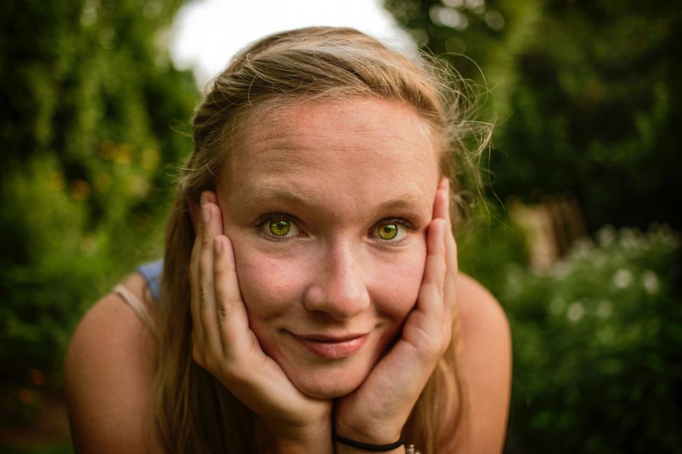 Free Image of Woman With Green Eyes Posing for a Picture 