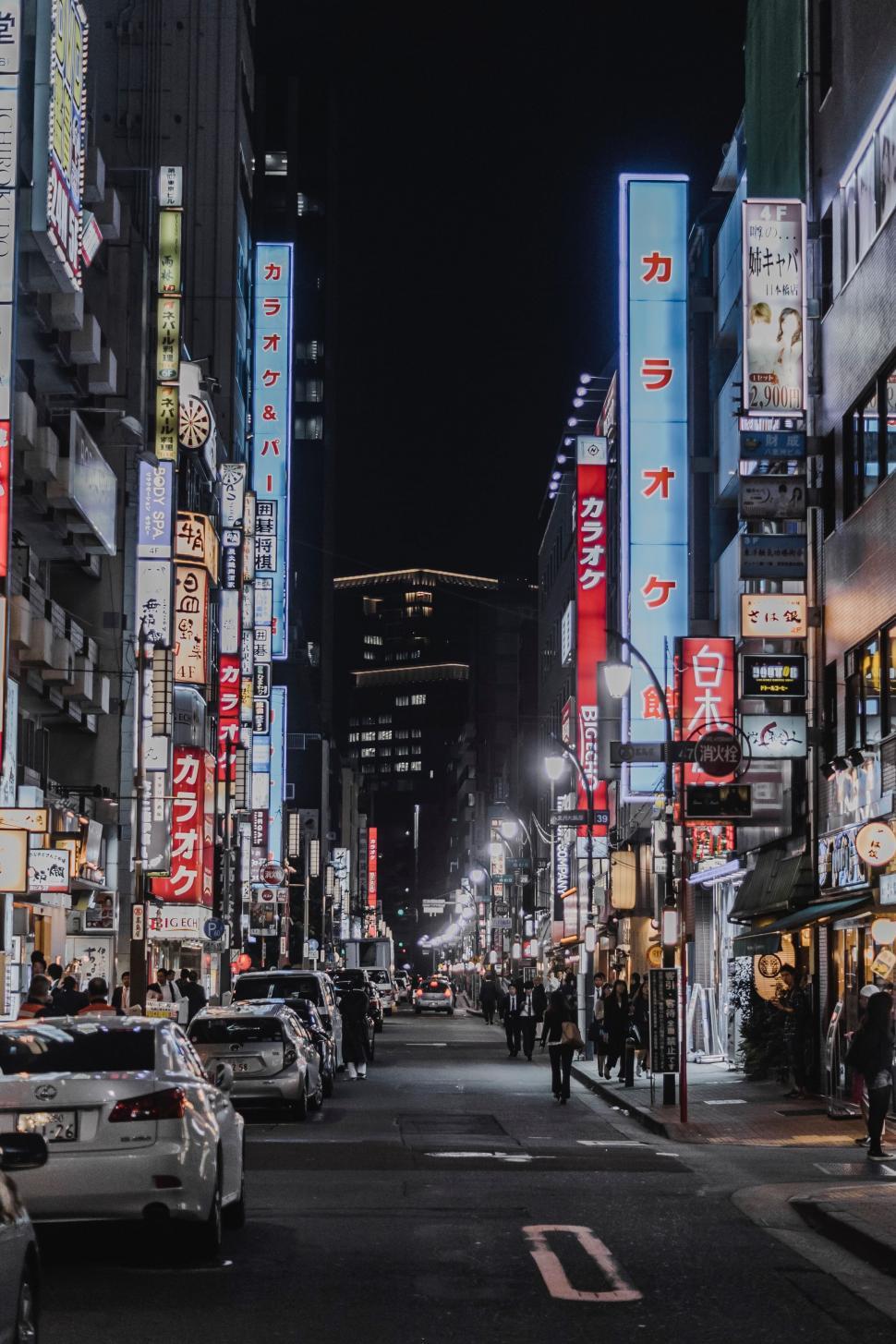 Free Image of City Street Filled With Tall Buildings 