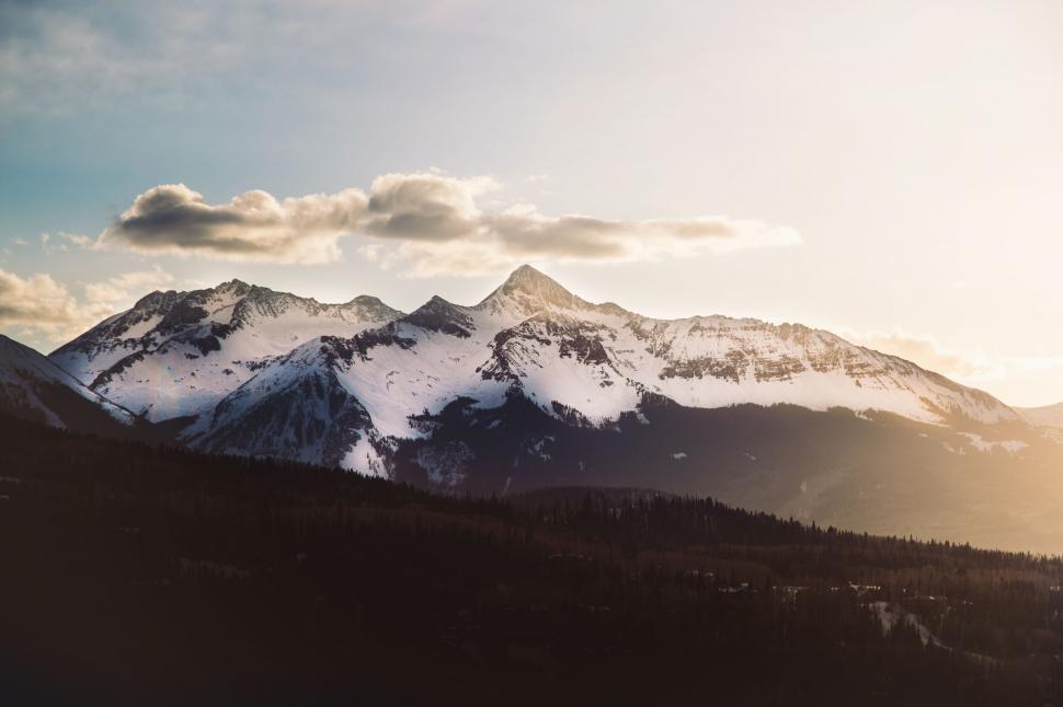 Free Image of Majestic Mountain Range With Clouds in the Sky 