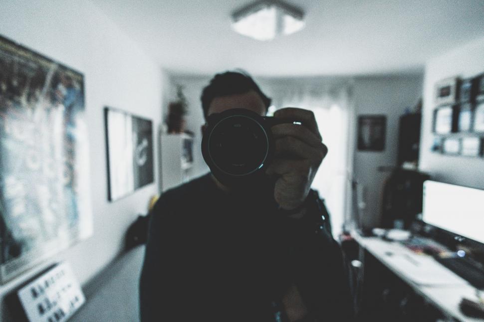 Free Image of Man Taking Selfie in Mirror 