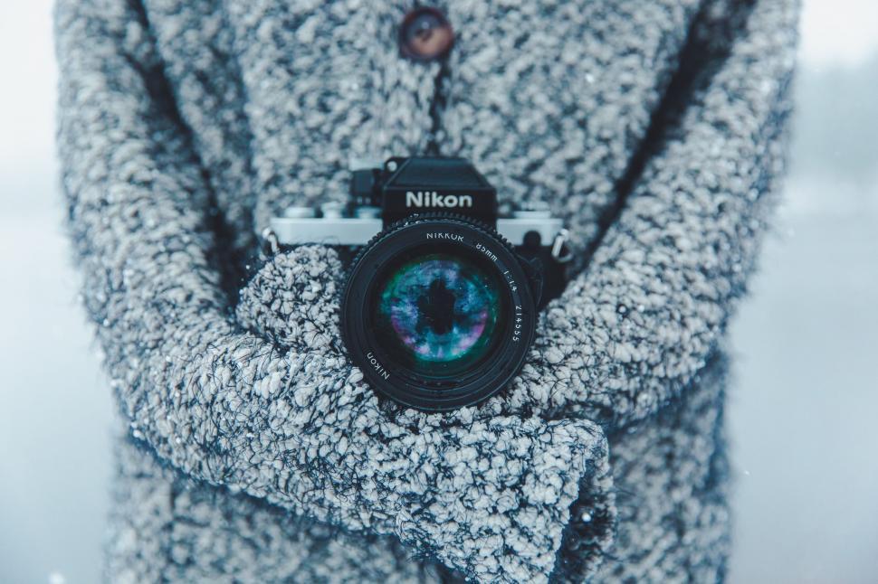 Free Image of Person Holding Camera 