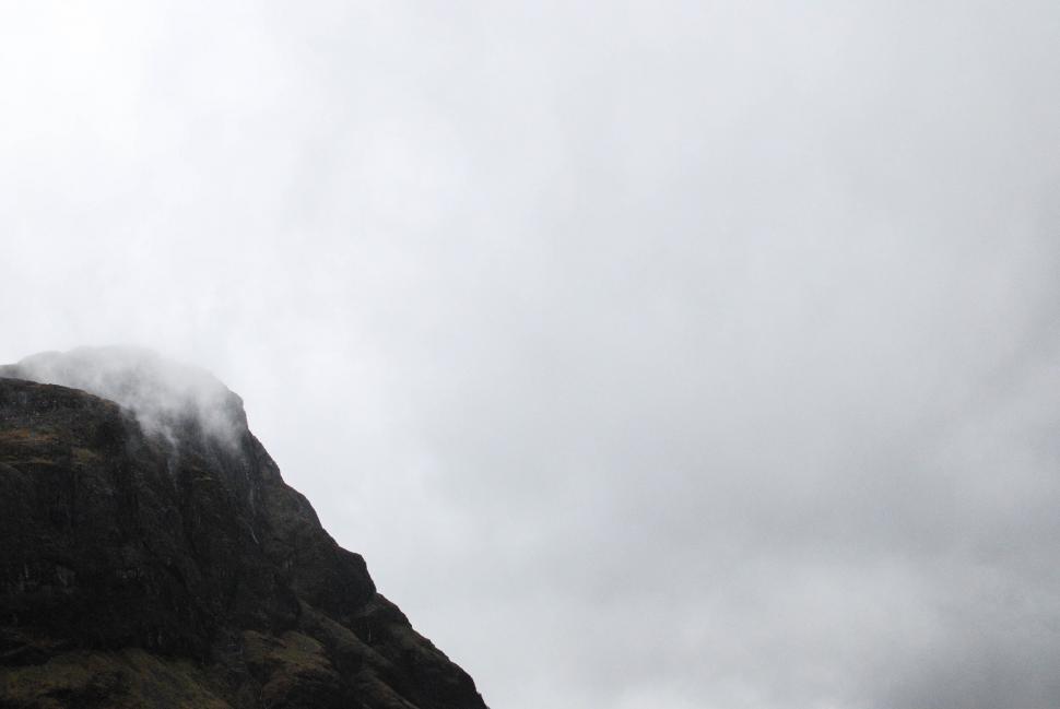 Free Image of Person Snowboarding on Mountain Top 