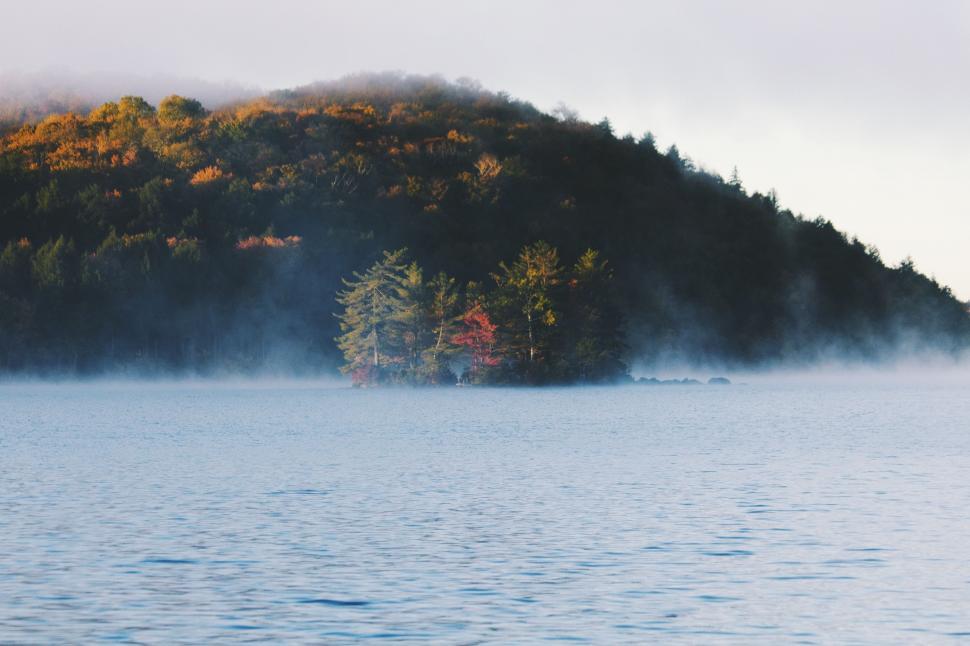 Free Image of Small Island Amidst Lake 