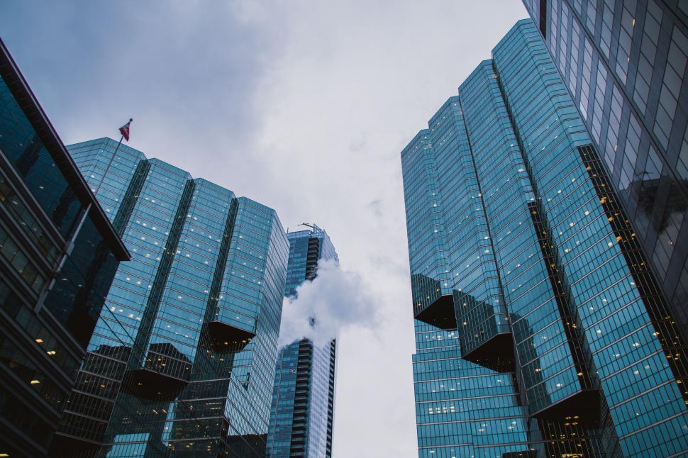 Free Image of Two Tall Buildings Towering Side by Side 