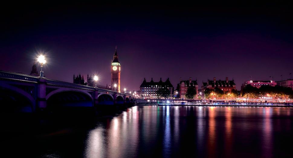 Free Image of Night View of City With Bridge and Clock Tower 