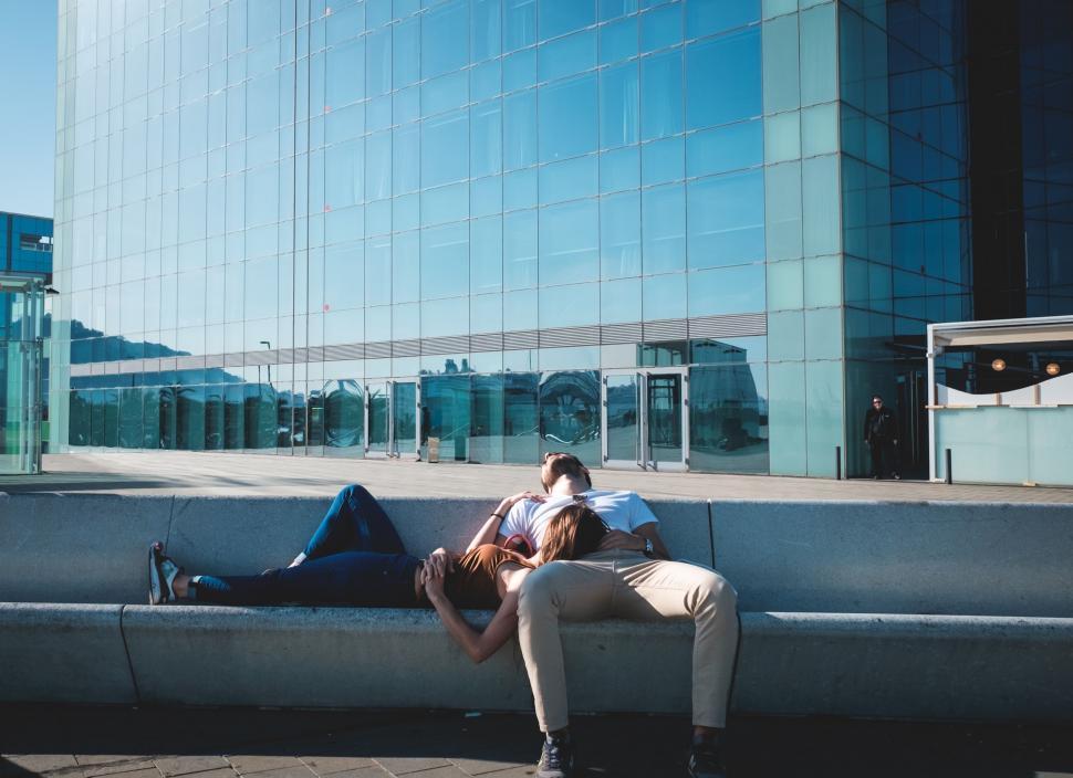 Free Image of Couple Sitting on Bench in Park 