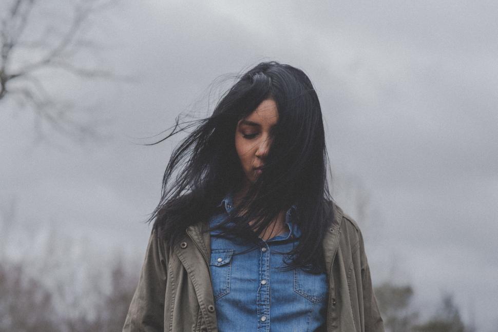 Free Image of Person With Long Hair and Blue Shirt 
