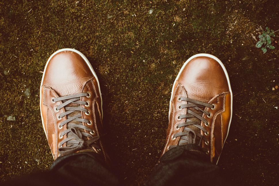 Free Image of Brown Shoes on Grass Field 
