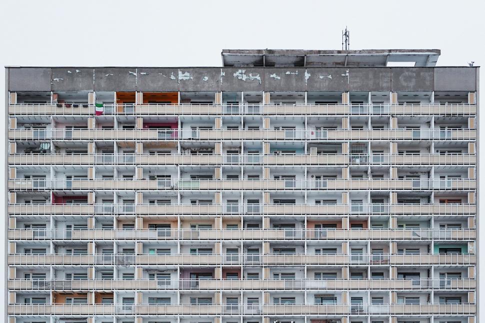 Free Image of Modern High-Rise Building With Numerous Windows and Balconies 