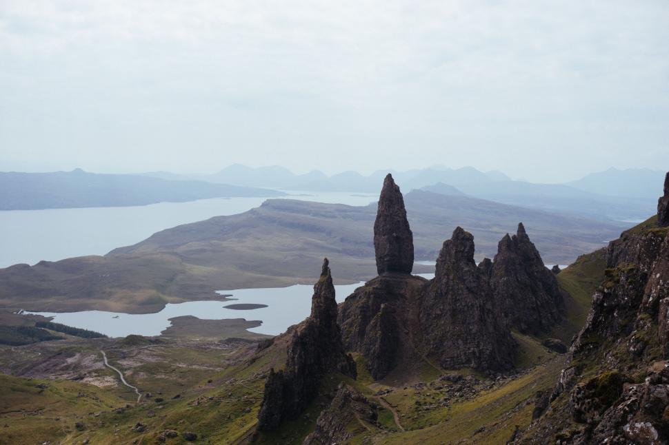 Free Image of Group of Rocks Perched on Mountain Slope 