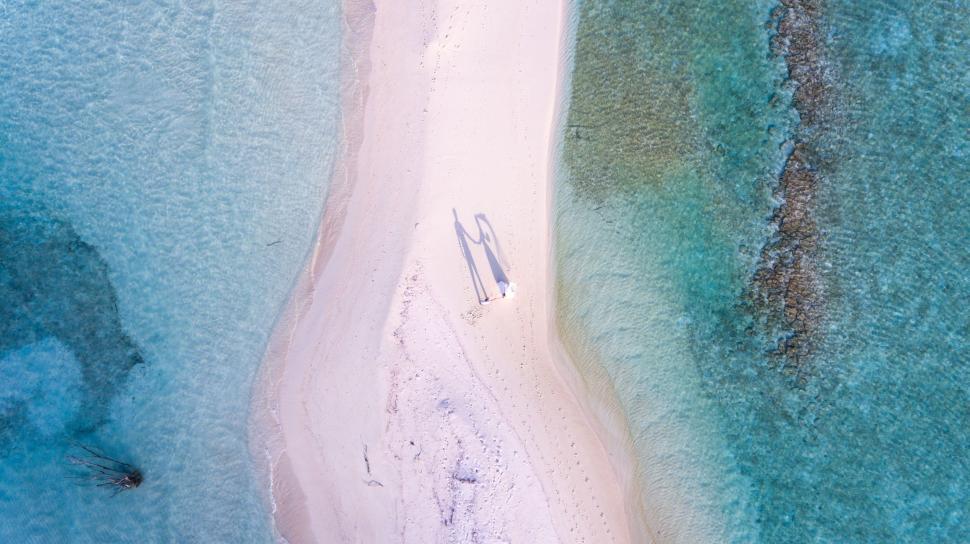 Free Image of Aerial View of Beach and Body of Water 