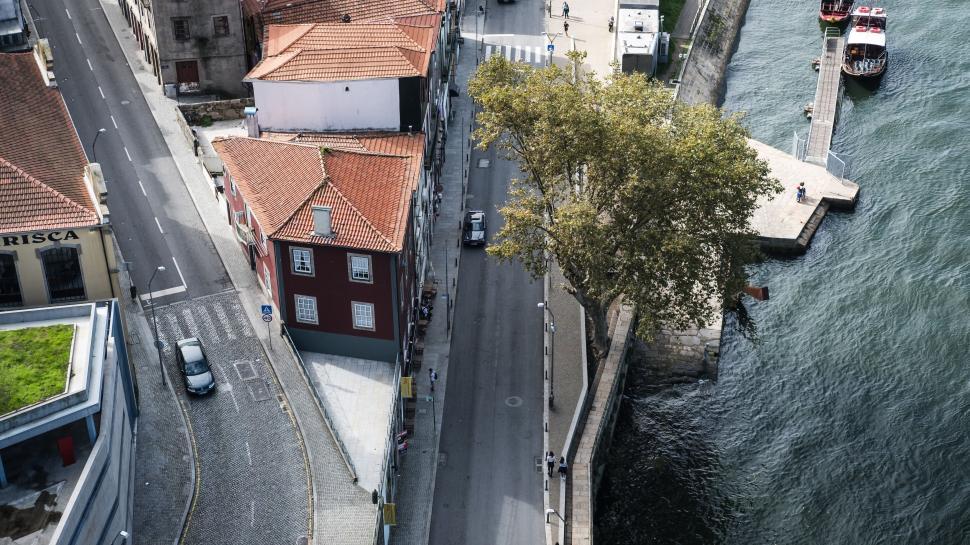 Free Image of Aerial View of City Next to Body of Water 