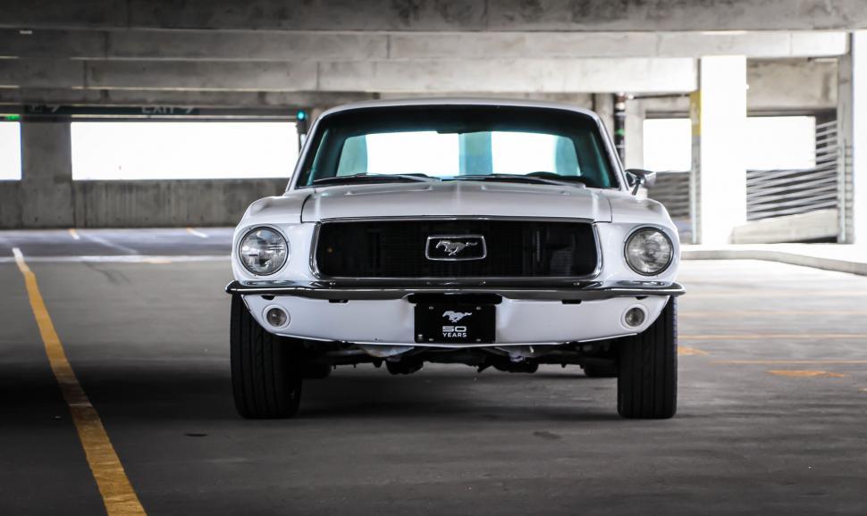 Free Image of White Truck Parked in Parking Garage 