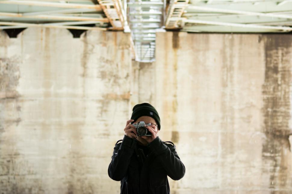 Free Image of Person Taking a Picture With a Camera 
