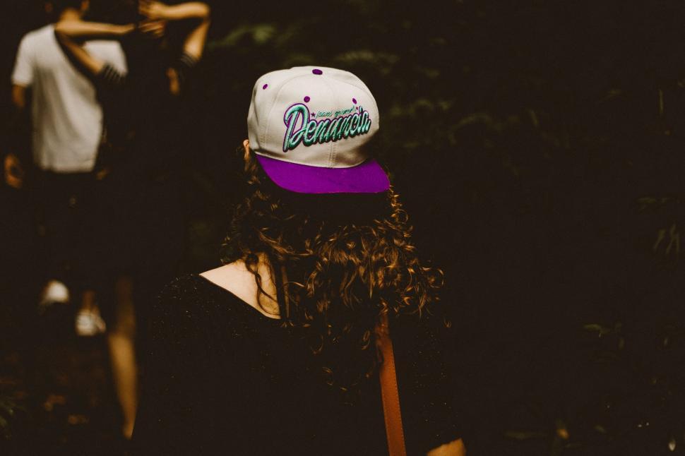 Free Image of Person Wearing Deucer Hat 
