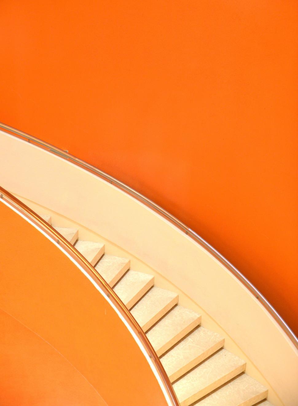 Free Image of Close Up of Clock on Orange Wall 