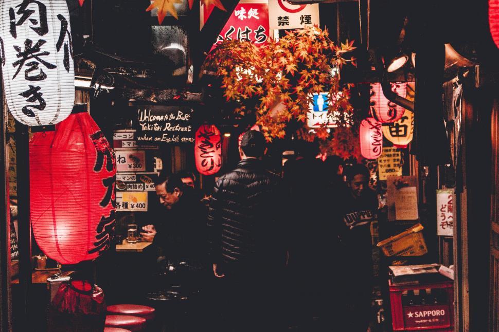 Free Image of Couple Standing in Front of Store 