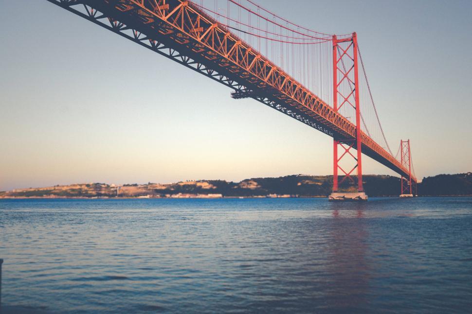 Free Image of Majestic Bridge Over Vast Water 