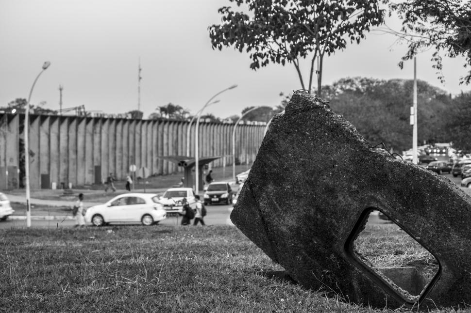 Free Image of Large Rock in Lush Green Field 