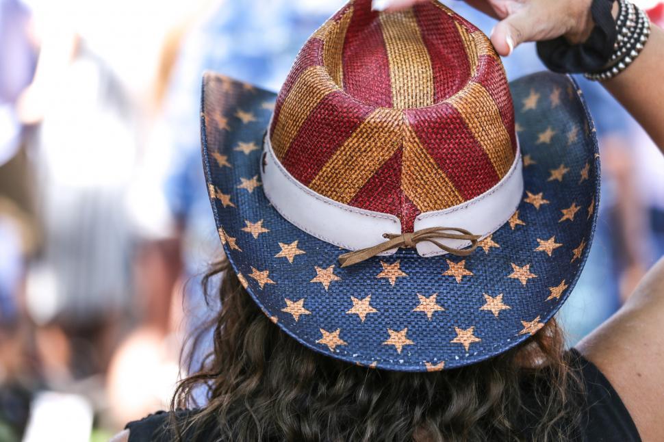 Free Image of Woman in Flag Hat 