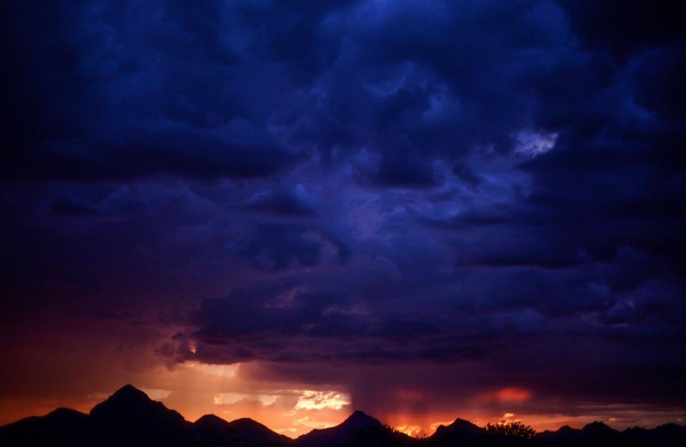 Free Image of Sunset Sky with storm clouds 