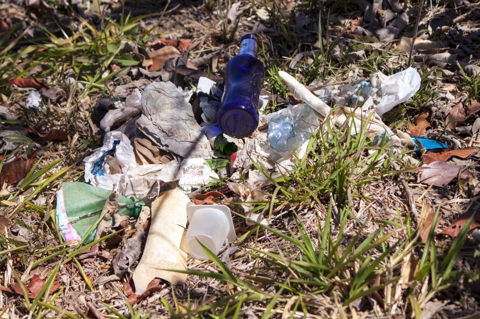 Free Image of Pile of Trash on Grass Covered Field 