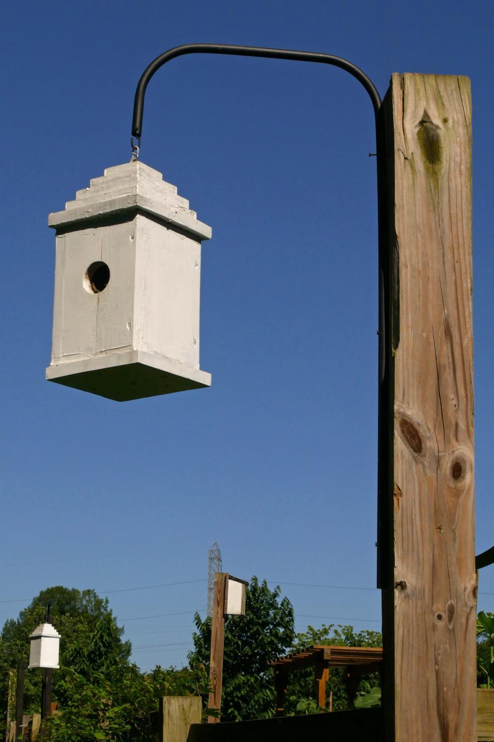 Free Image of Birdhouses Hang on Posts 