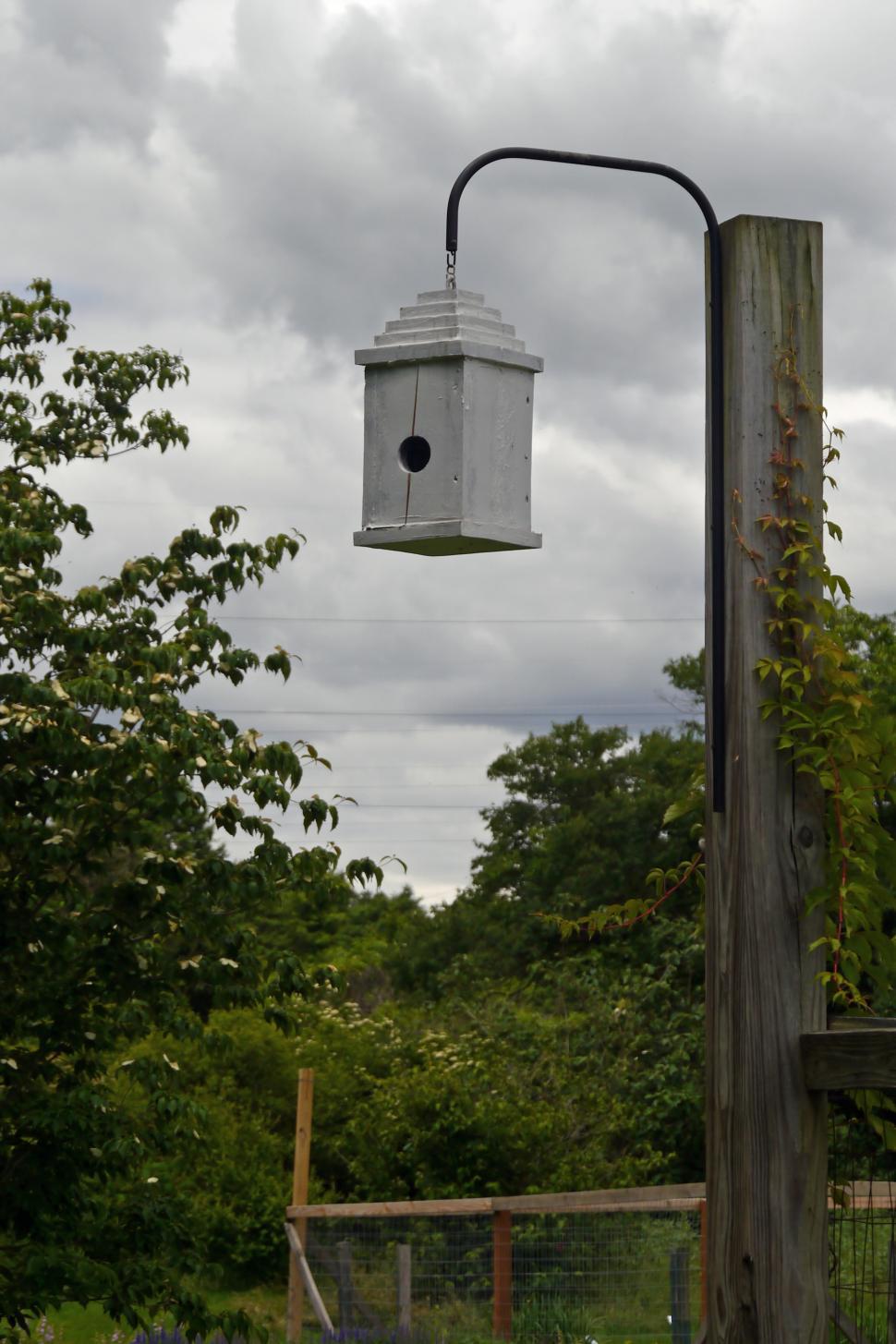 Free Image of Birdhouse on post 