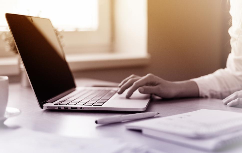Free Image of Woman Working On Laptop - Close-Up of Hands 