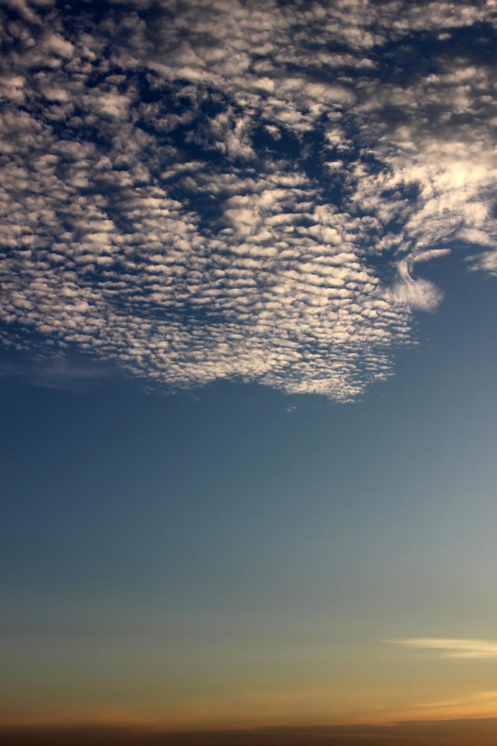 Free Image of Background of half clear blue sky and half broken clouds  