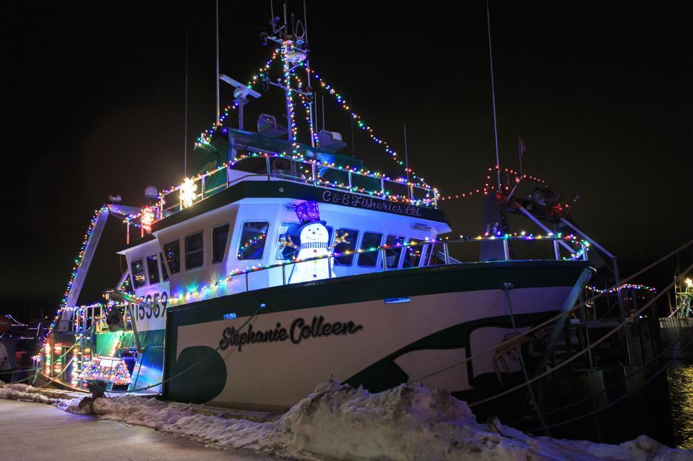 Free Image of Christmas lights on a fishing boat 