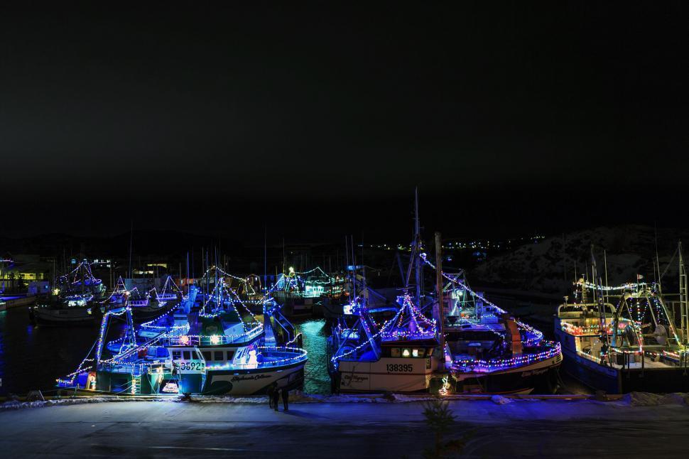 Free Image of Harbor with lighted fishing boats 
