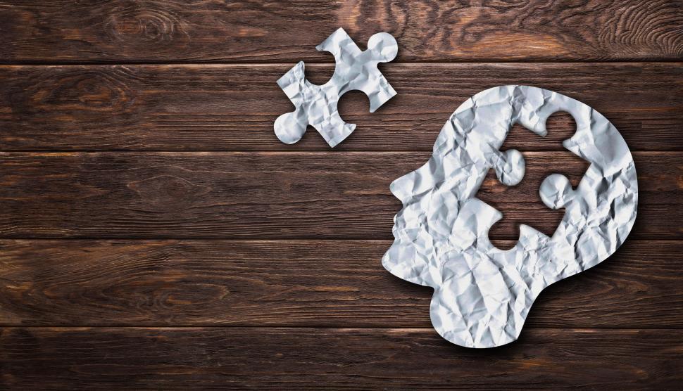 Free Image of Solving a Problem - Concept With Crumpled Paper Head Silhouette 