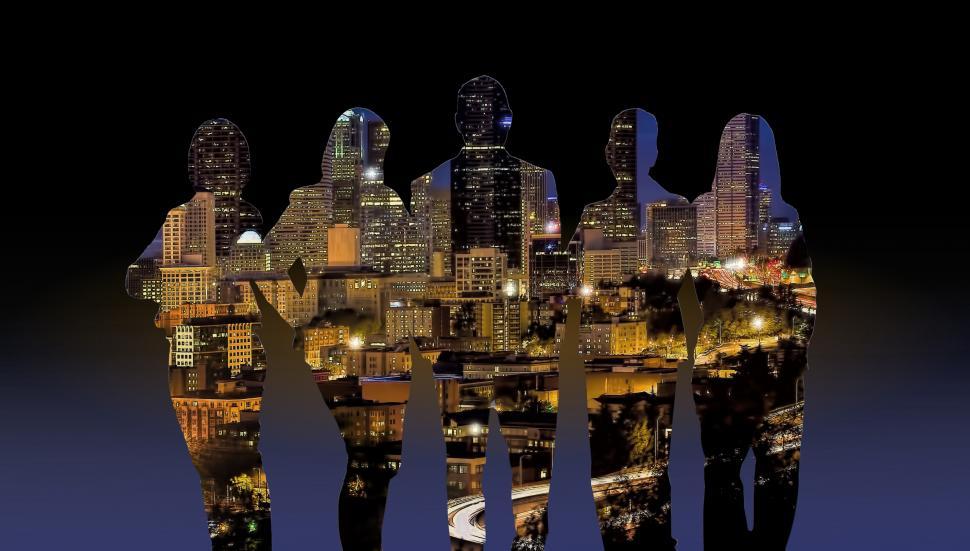 Free Image of Silhouettes of People Over Cityscape 