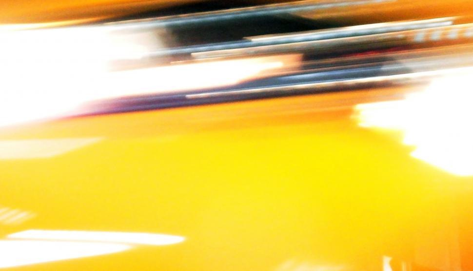 Free Image of Vibrant yellow light effects background  