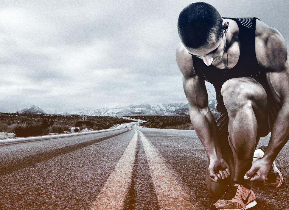 Free Image of Hit the Road - A Man Prepares to Run - Running 