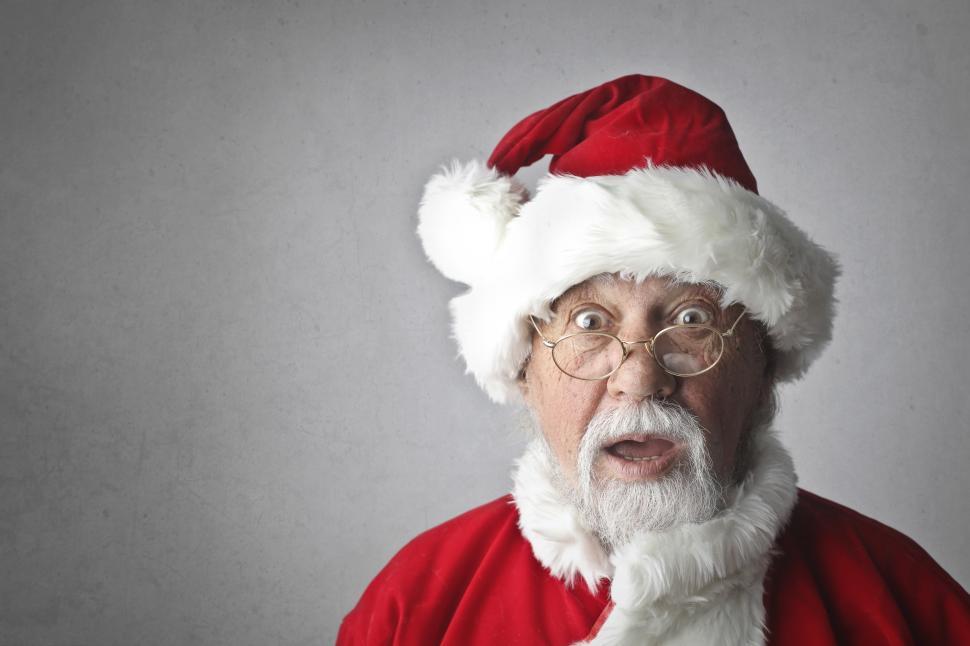 Free Image of Portrait Of Santa Claus in Spectacles Isolated On Grey Backgroun 