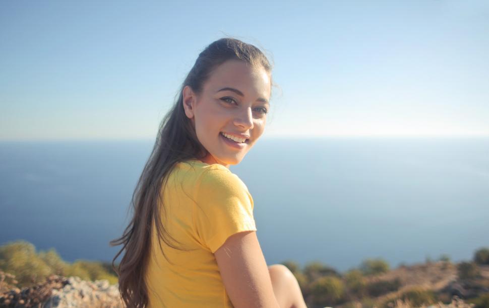 Free Image of Portrait of Young Woman In Yellow Shirt 