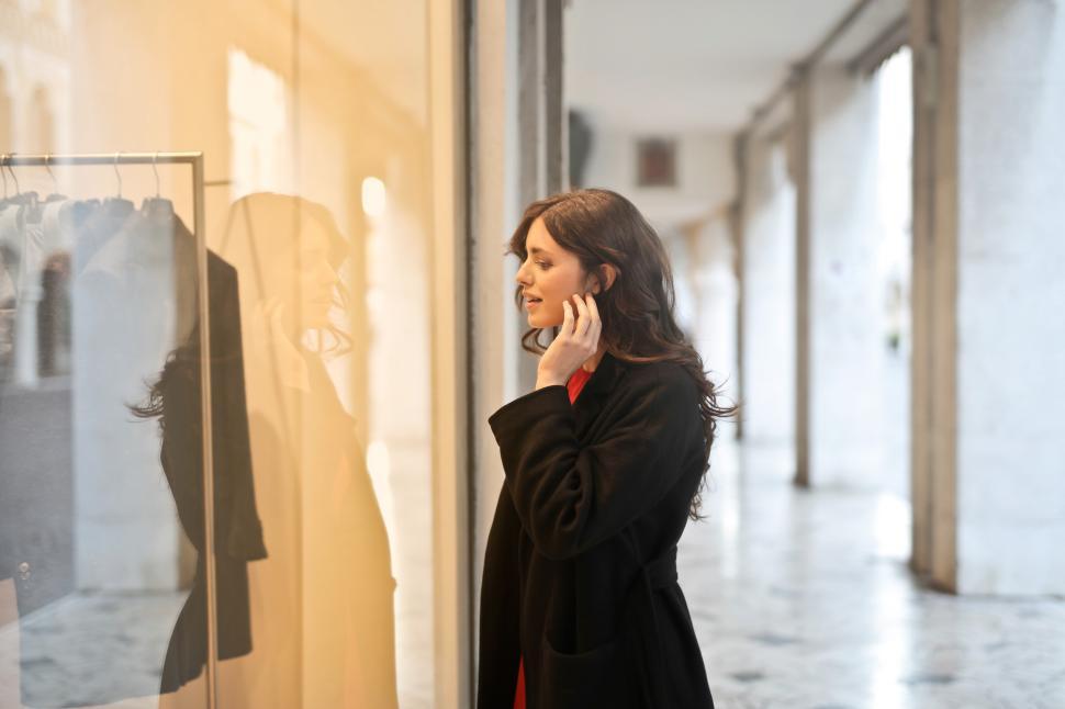 Free Image of Young Woman Doing Window Shopping 