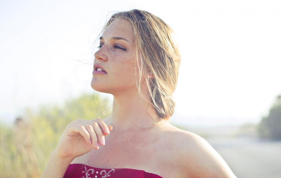 Free Image of Portrait Of Female Fashion Model In Red Gown 