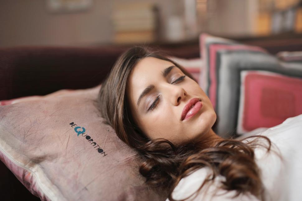 Free Image of A young brunette woman sleeping 