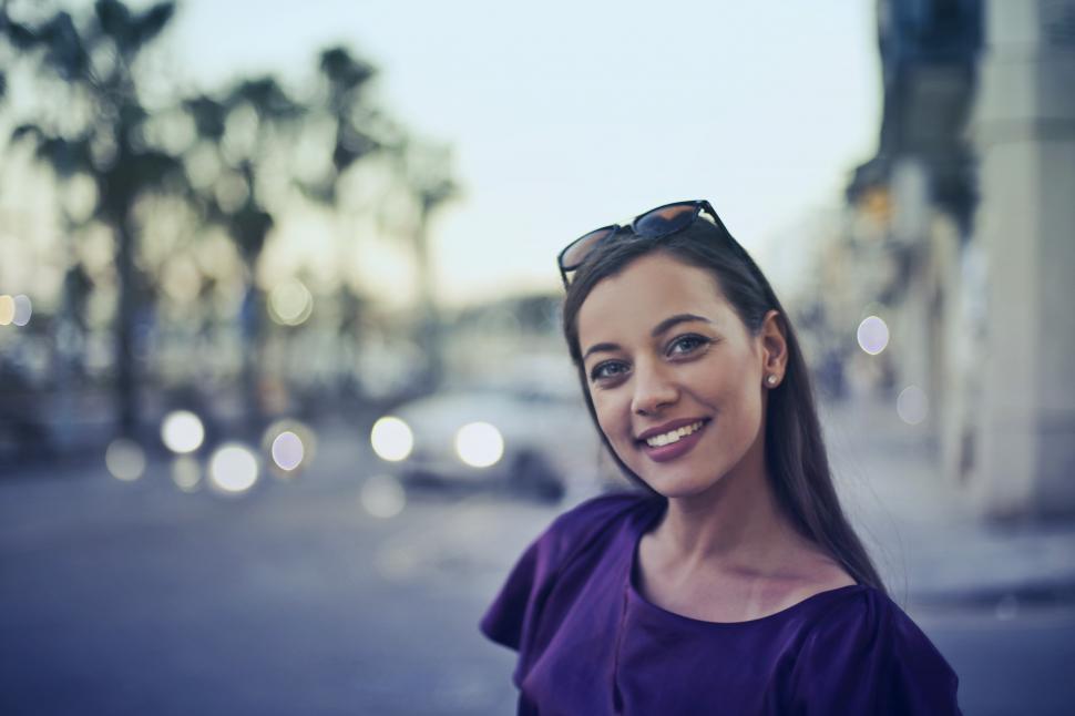 Free Image of A young blonde woman posing outdoors 