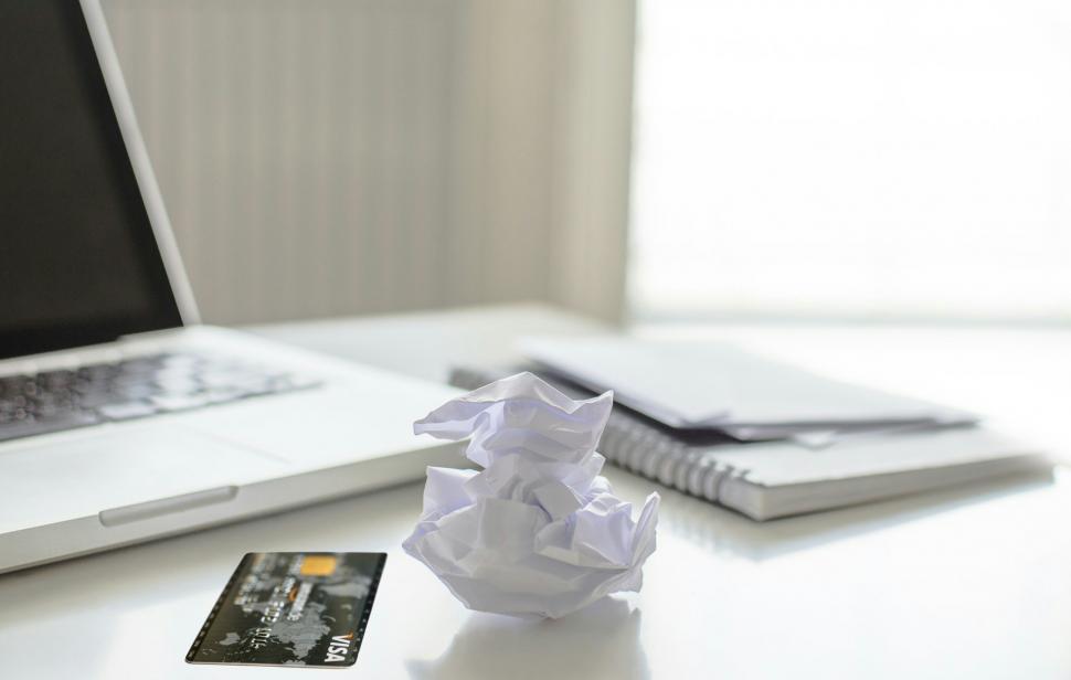 Free Image of Credit card and crumpled paper 