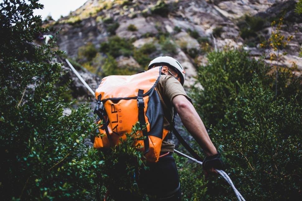 Free Image of A climber repelling a mountain 